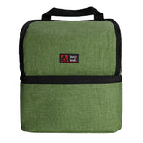 Green lunch box on a white background